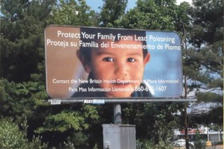 A multi-language billboard promotes lead poisoning awareness in New Britain.