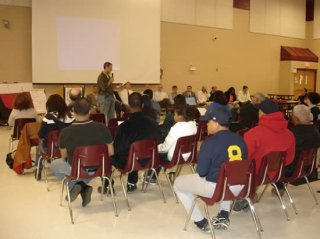 Neighbors of the former Gorham Manufacturing Site in Providence lead a community forum with the parties responsible for cleaning up contaminated soil and groundwater at Alvarez High School in May 2010.