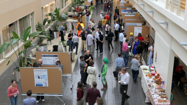 Bird's eye view of the TRP Halloween Poster Session in 2023.