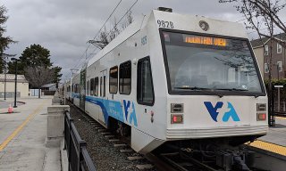 This is a picture of a light rail train, the Valley Transportation Agency, which serves San Jose and the Silicon Valley suburbs.