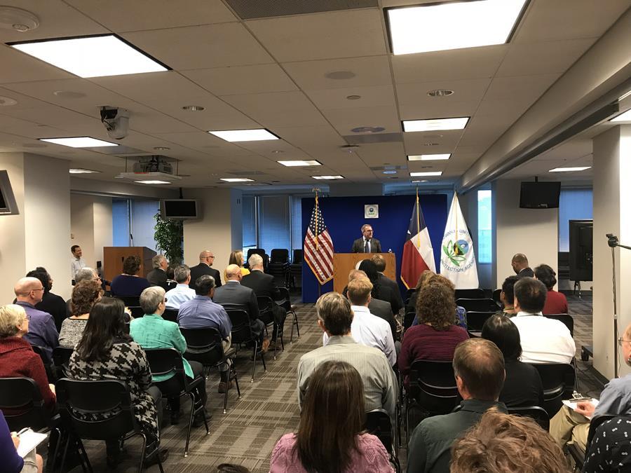 Wheeler standing at the podium.