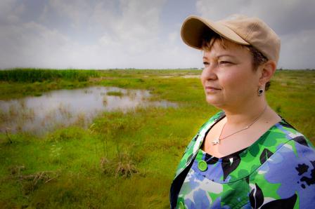 Administrator Lisa Jackson at a wetlands restoration