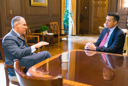 EPA Administrator Scott Pruitt sitting at a table with Nevada Governor Brian Sandoval.