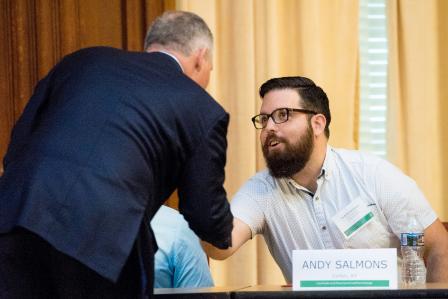 Administrator Pruitt greets leans in to shake hands and greet Andrew Salmon, Director of Downtown Corbin
