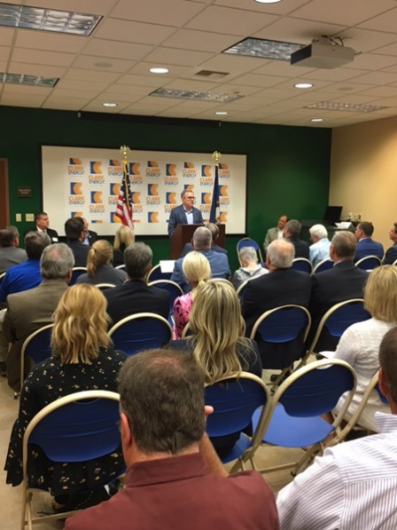 Wheeler speaking from podium, discussing ACE proposal.