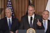 Secretary of the Interior Ryan Zinke, flanked by VP Mike Pence and EPA Administrator Scott Pruitt.