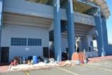 View outside of a large building with a pile of hazardous materials 