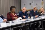 Administrator Pruitt sits at a long table with others