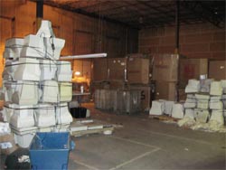 photograph of warehouse storing abandoned crts