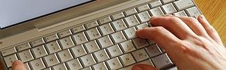 Picture of keyboard with hand typing