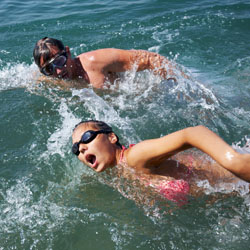 Man and woman swimming