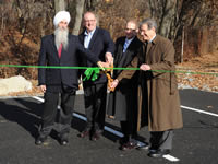 Dignitaries cutting the ribbon.