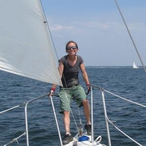 Off duty, enjoying the adrenaline of a sailboat race in Pensacola Bay.