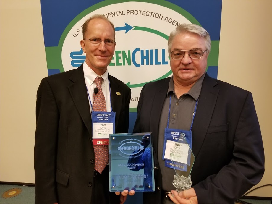 Benny Smith accepts Price Chopper’s Superior Goal Achievement and Distinguished Partner recognitions from Tom Land of the EPA GreenChill Program