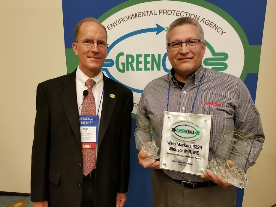 John T. Lerch accepts Weis Market’s Superior Goal Achievement, Exceptional Goal Achievement, and Store Re-Certification Excellence recognitions from Tom Land of the EPA GreenChill Program