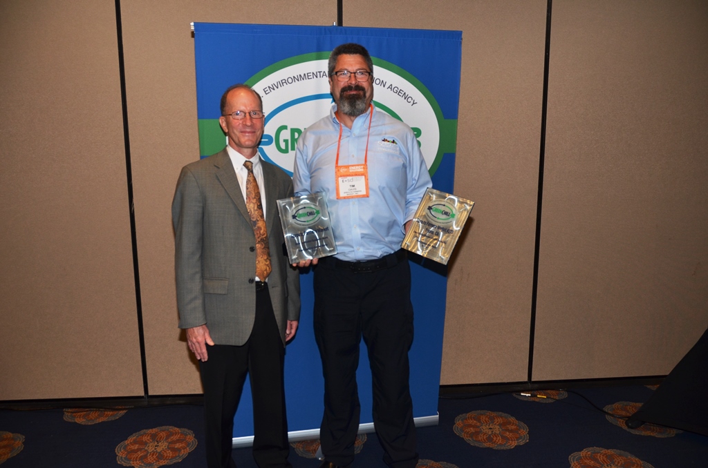 Tim Davis of Sprouts Farmers Market accepts Store Certification Excellence and Store Re-Certification Excellence recognitions from Tom Land of the EPA GreenChill Program
