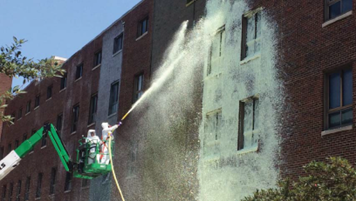 Washing of brick building during radiological decontamination demonstration