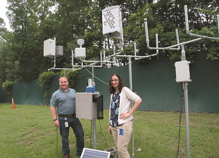 Researchers with fenceline monitoring system