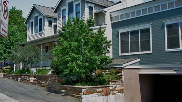 By placing parking spots underground, the developer was able to provide more homes and a wider variety of uses on this small lot.