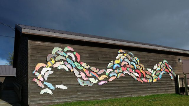 Salmon art on building in Dillingham, Alaska.