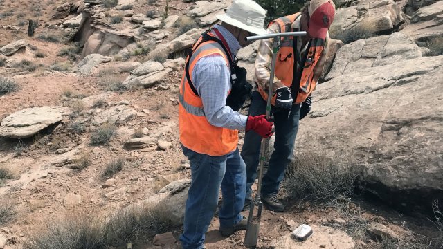 Cyprus Amax taking a subsurface soil sample using a hand auger at the King Tutt Point mine in Red Valley