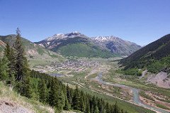 View of the town of Silverton, Colorado with the Animas River flowing in the lower right-hand portion of the photograph, taken from Highway 550