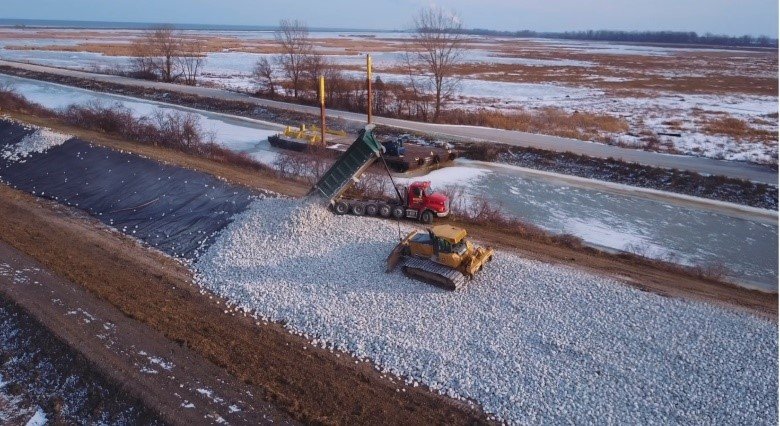 Rock is placed in Howard March (Maumee AOC) to create 1,000 acres of diverse marsh habitat on the shores of Lake Erie. Photo Credit: Toledo Metroparks