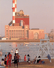 view of factory by beach