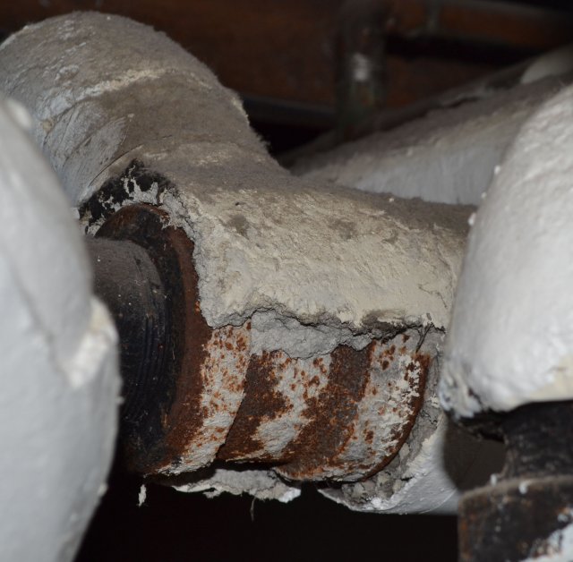 Should I worry about this pipe insulation? (fiberglass vs asbestos