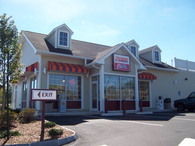 The Dunkin Donuts restaurant and Baskin Robbins restaurant in the commercial retail plaza on the site