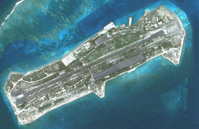 Aerial photograph of Johnston Atoll showing runways surrounded by water.