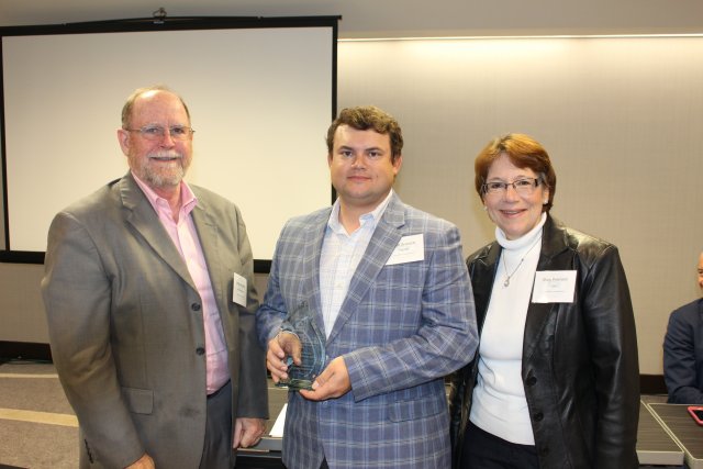 EPA’s Jim Woolford (left) and Region 7 Superfund Division Director Mary Peterson (right) with IDNR award recipient Matt Graesch 