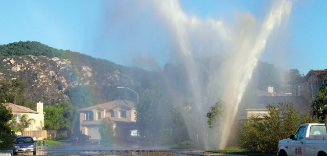 Water Main Break in Suburban Neighborhood