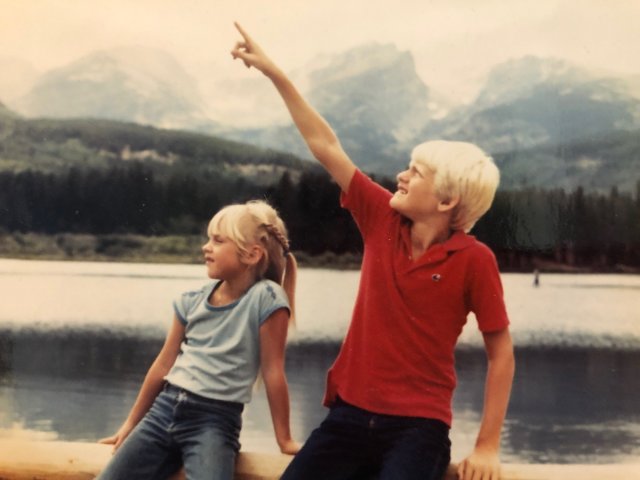 Rebecca taking in the view with her older brother somewhere in the Rocky Mountains sometime around Earth Day in the 1980s. Growing up in Colorado, she spent a lot of quality family time in the station wagon going to state and national parks in the wester