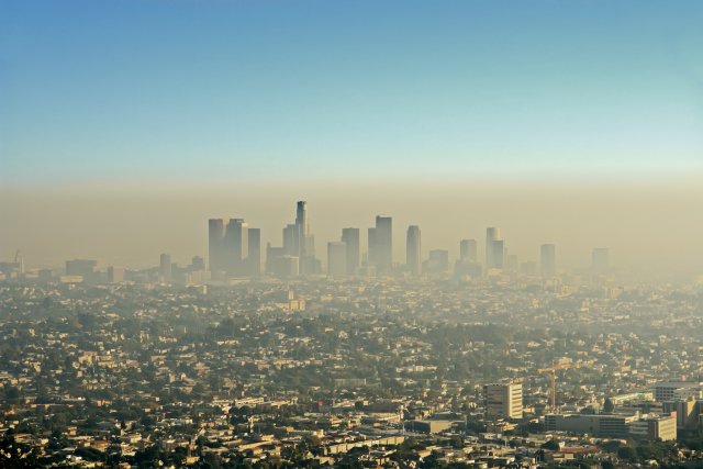 research paper on air pollution A city skyline enveloped by smog