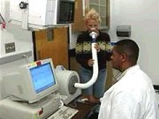 Photo of an EPA volunteers using a spirometer.