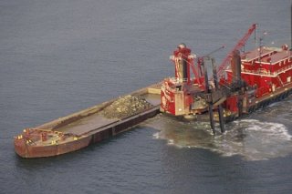 Dredging in New York Harbor, NY.