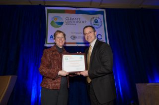Beth Craig, US EPA, with David Tulauskas, General Motors, Chevrolet Clean Energy Campus Campaign 