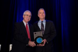 Dennis McLerran, US EPA, with Rick Love, United Technologies Corporation
