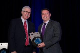 Dennis McLerran, US EPA, with Scott Tew, Ingersoll Rand