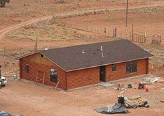 New wood home built to replace uranium contaminated structure on Navajo Nation.