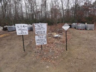 Fencing divides the property into several zones according to the site's Health and Safety Plan. This reduces possible movement of contamination from the site.