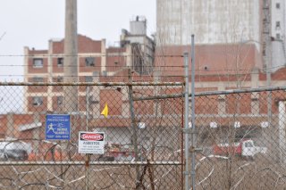 Site entrance gate to the Pillsbury Mills facility.