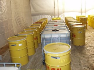 Properly packaged and sorted containers within the on-site warming room, where containers with frozen contents will thaw prior to shipping.  These containers await their proper shipping labels.