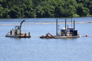 Hydraulic Dredge Unit with Turbidity Curtain in Background – July 2017