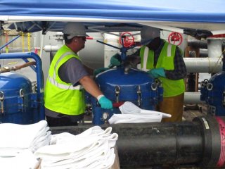 Equipment Maintenance – Filter Bag Being Changed-out – July 2017