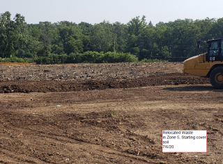 View of Zone 5 where waste was consolidated. Soil cover installation is in progress