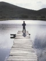 person walking on pier