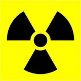 This image shows a circle segmented into sixths in alternating black and yellow, with a black circle in the middle. It is the international symbol for radiation.