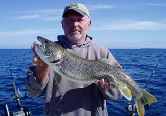 Man holding a fish in his hands